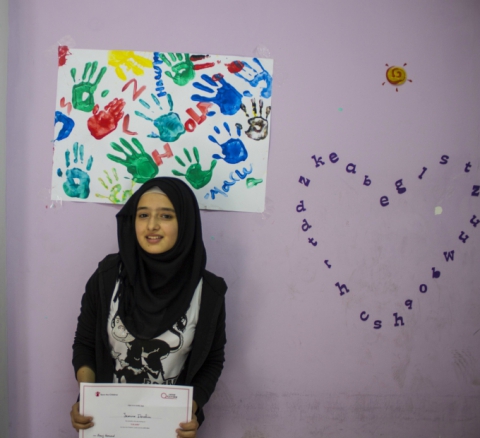 Raghda was awarded with a certificate of completion